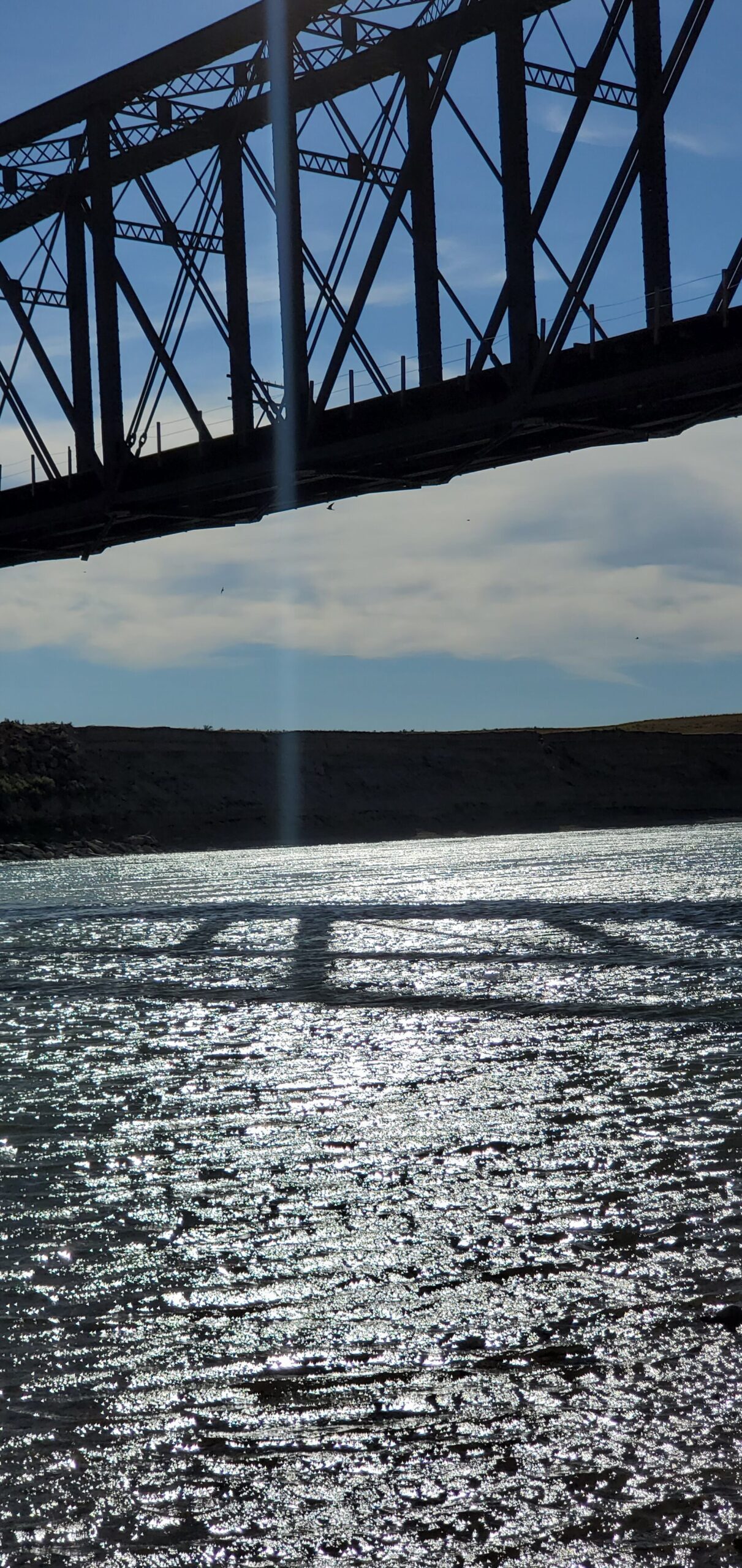 Terry Montana view of rickety bridge over yellowstone river