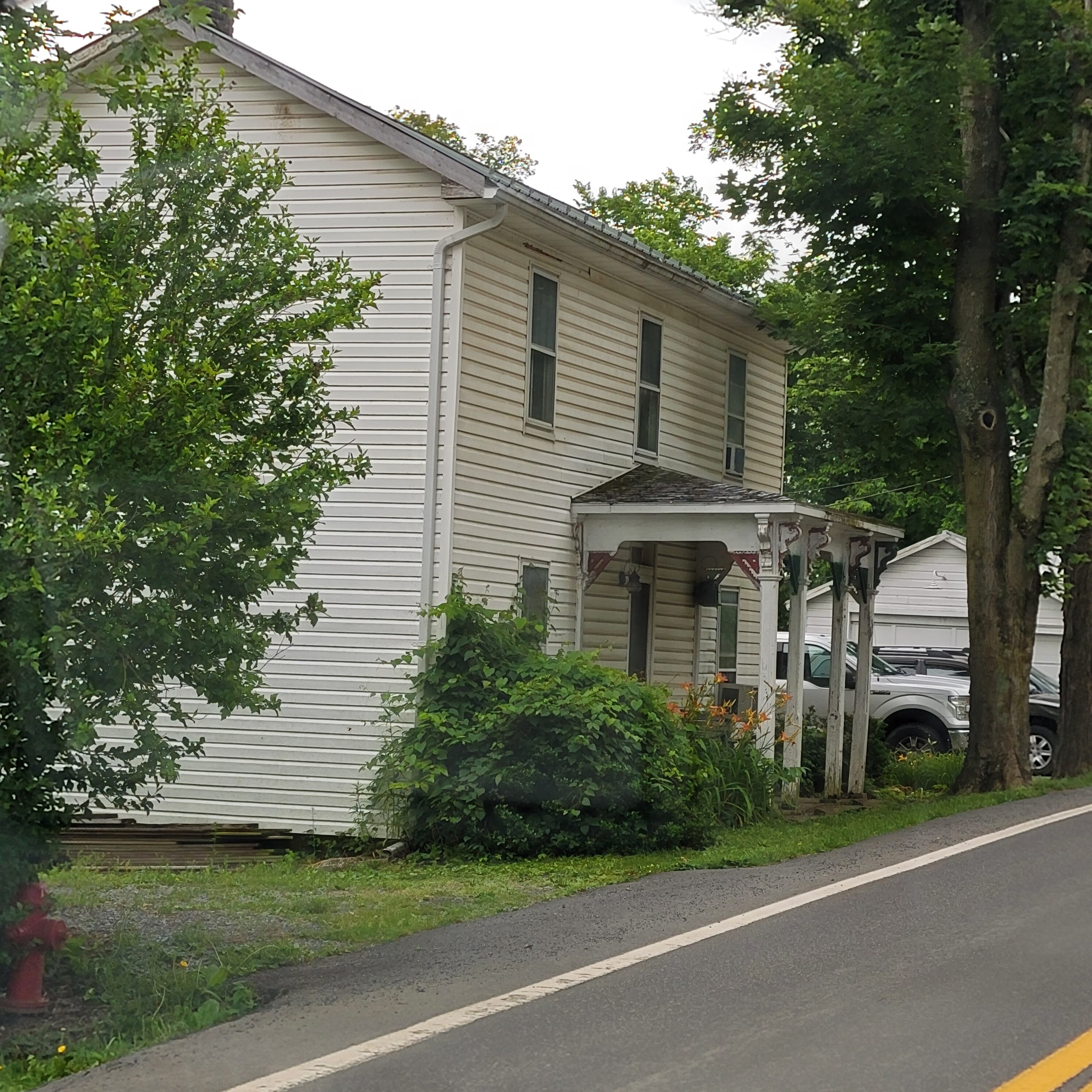 The roads are very close to the houses in West Virginia