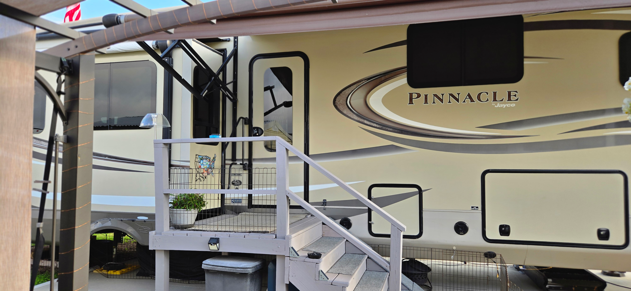 RV with perm steps set up outside